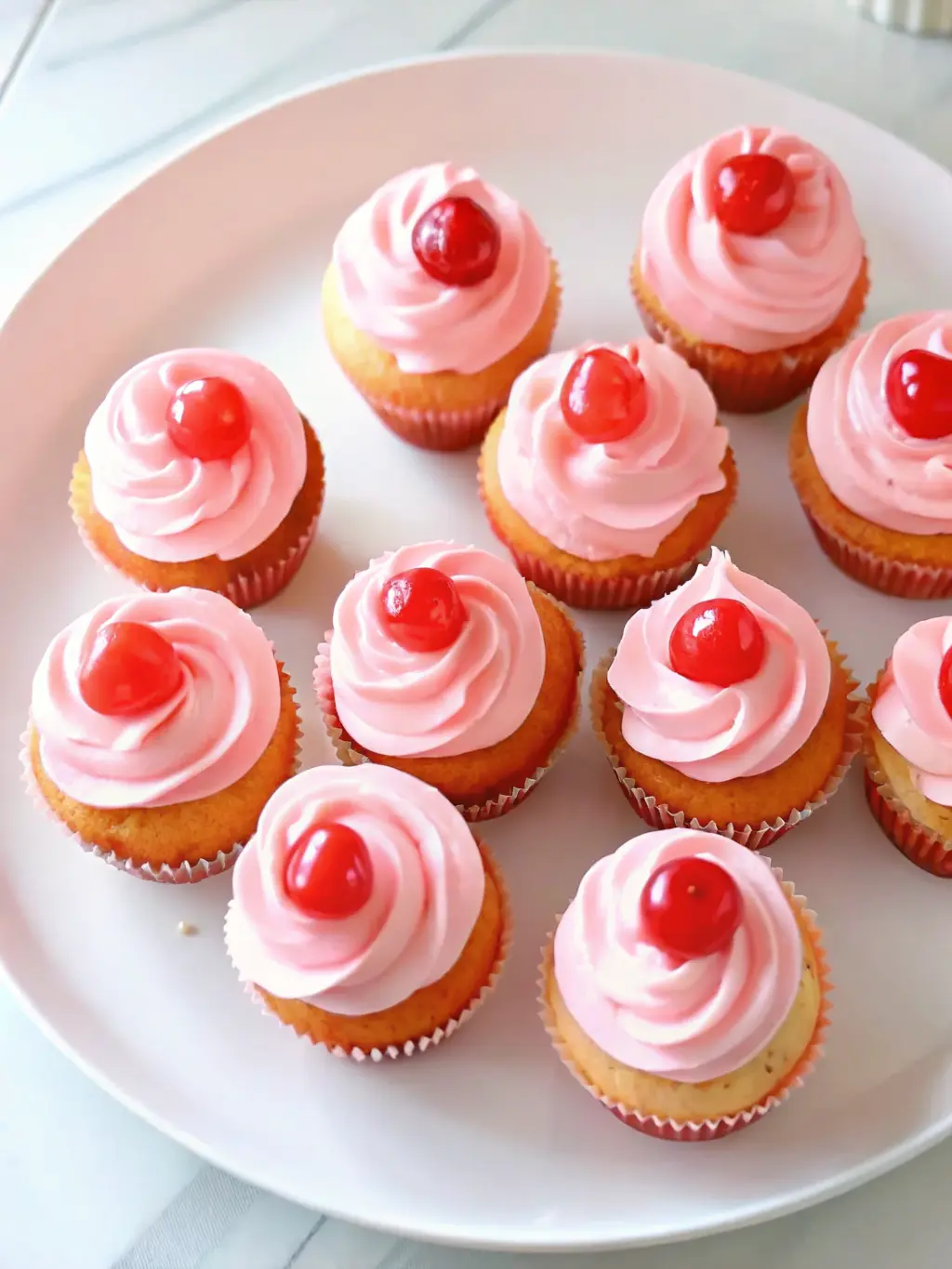 Ingredients for Cherry Chip Cupcakes neatly arranged on a wooden cutting board on a white marble countertop. Focus on a bowl of chopped maraschino cherries, a stick of butter, eggs, and a small jug of milk, with fresh herbs subtly in the background. Natural morning light, warm tones. 3:4 ratio. NO HANDS OR PEOPLE.